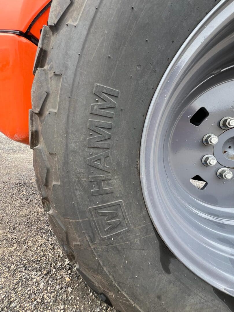 Close-up HAMM roller tire and rim
