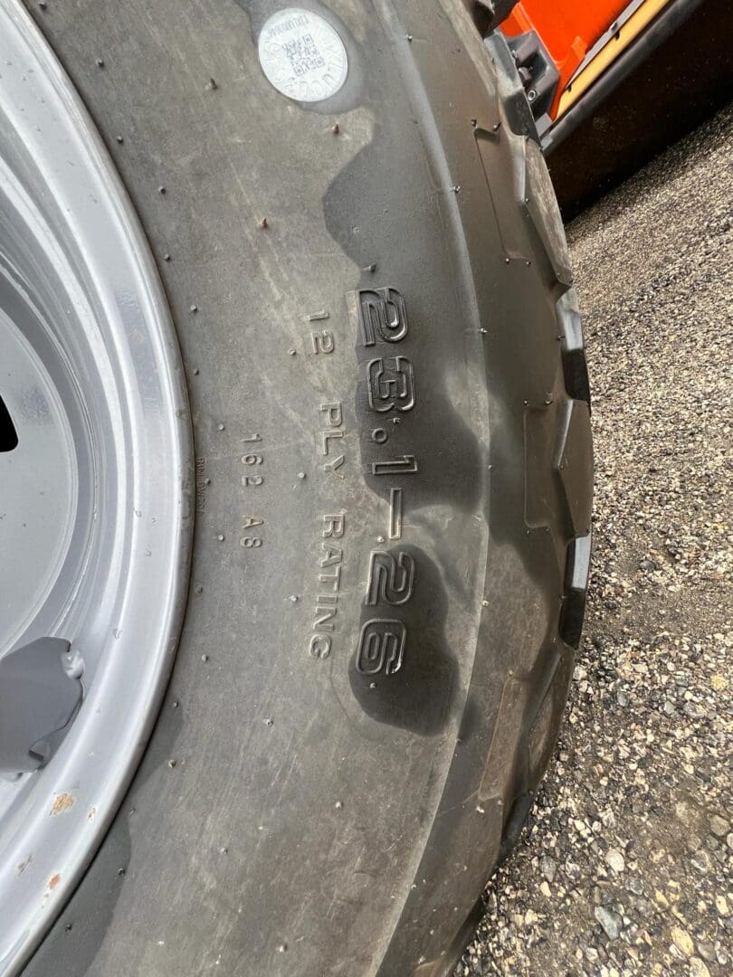 Close-up of large tractor tire sidewall