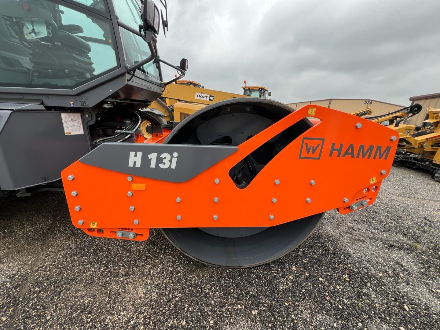 Orange HAMM H13i single drum roller
