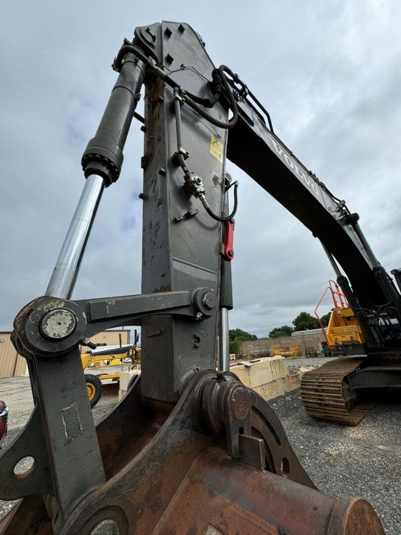 Excavator hydraulic arm and bucket close-up