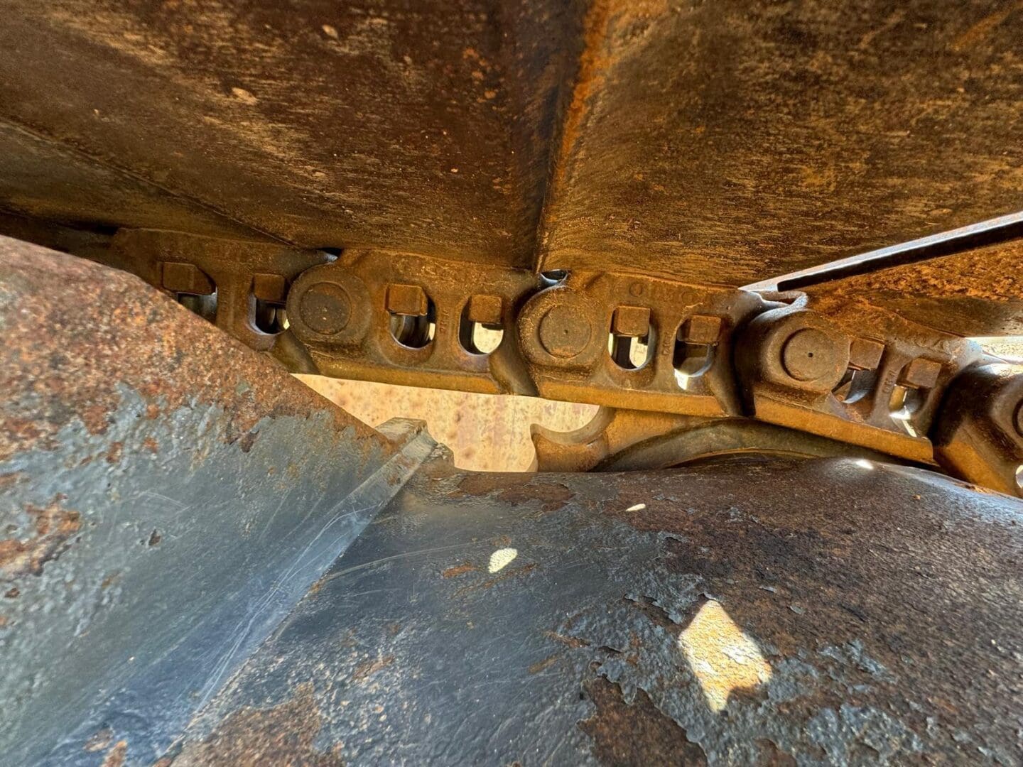 Close up of rusty heavy equipment track