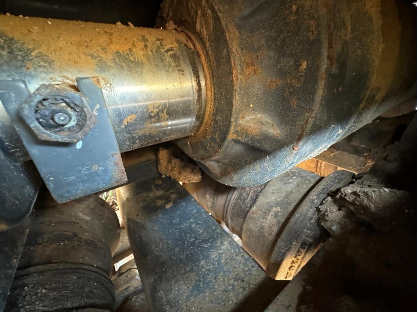 Rusty rotating shaft and coupling in machinery