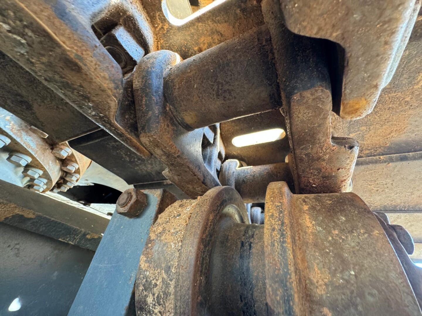 Close-up of rusted excavator track roller