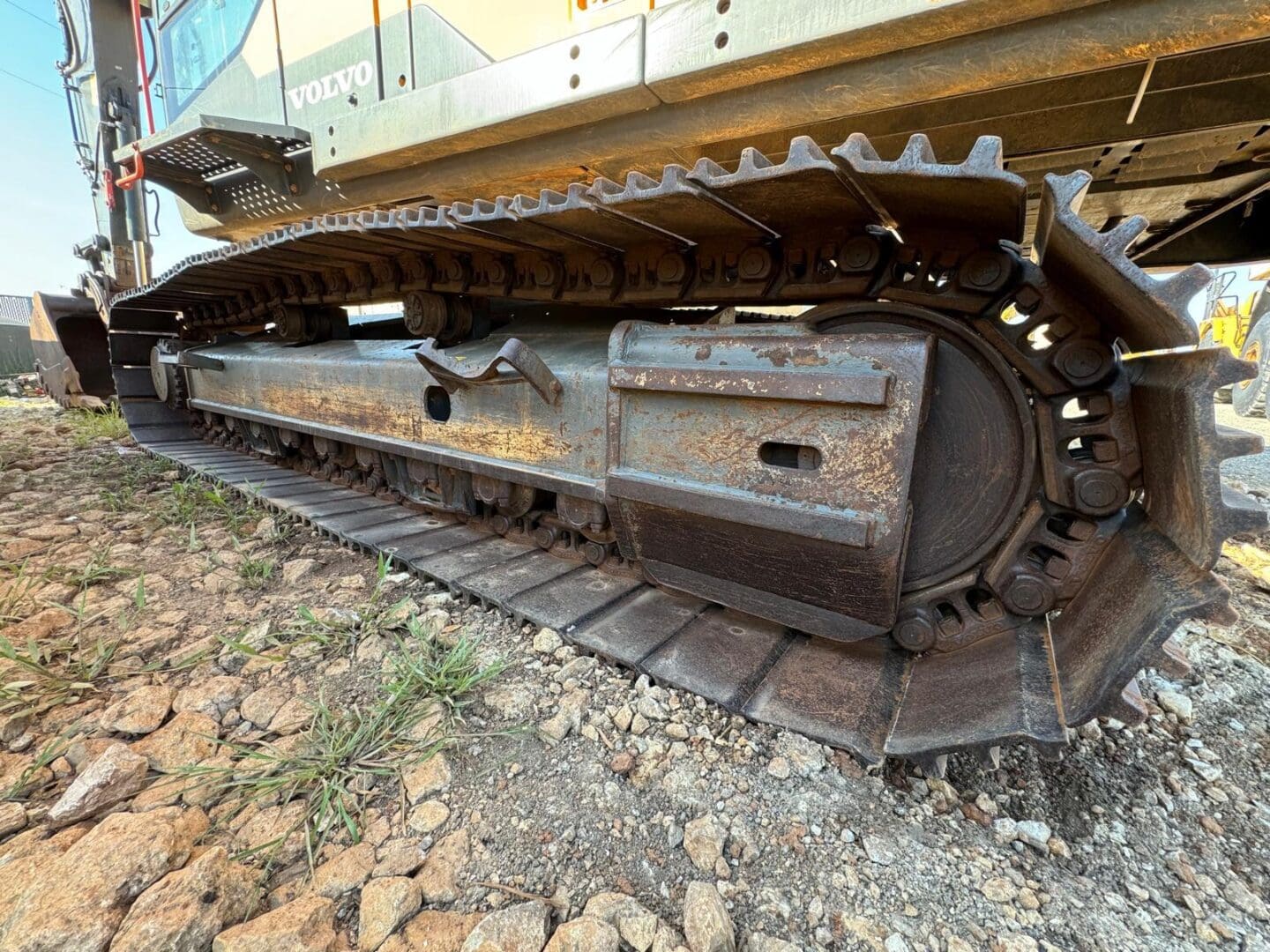 Close-up of rusty excavator crawler track