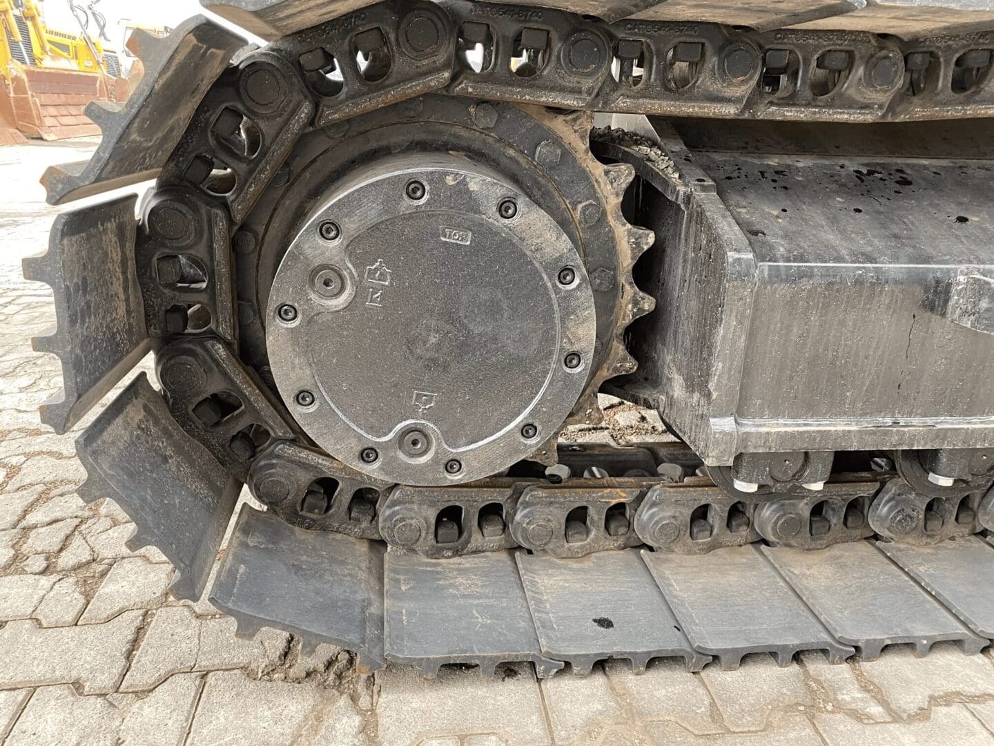 Excavator track and sprocket close-up