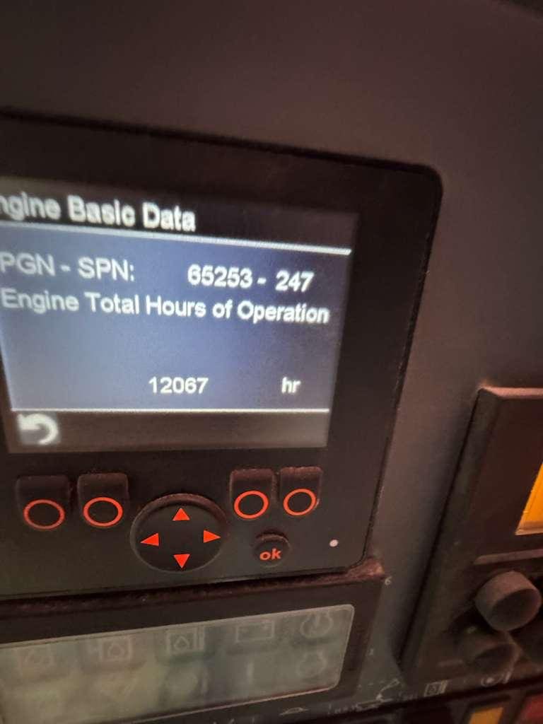 Engine display showing total hours 12067