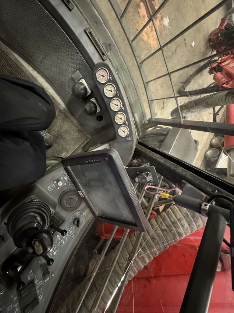 Heavy equipment cabin control panel and monitor