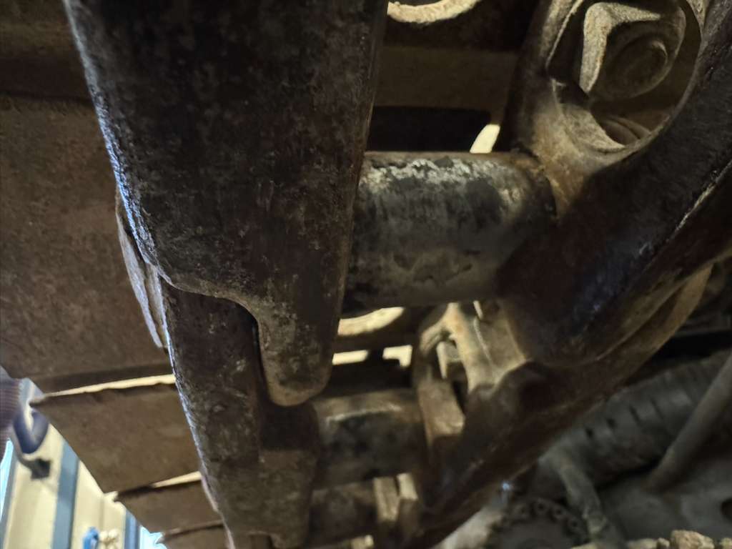 Close-up of rusted industrial track links
