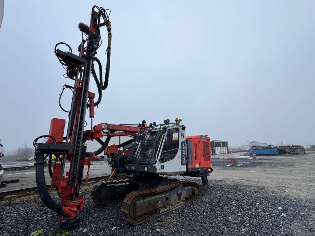 Crawler-mounted drilling rig on construction site