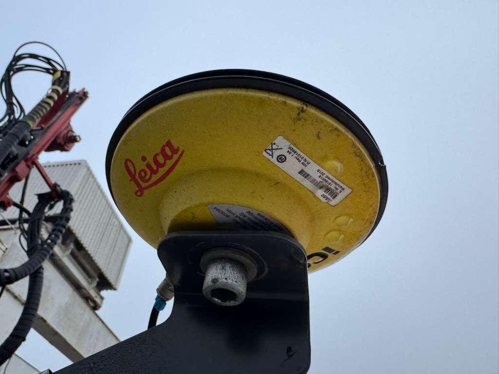 Yellow Leica GNSS survey antenna on equipment