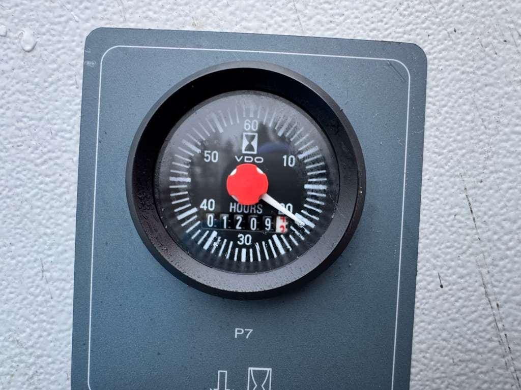Panel-mounted VDO hour meter gauge