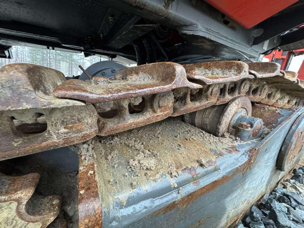 Close-up of rusty excavator track