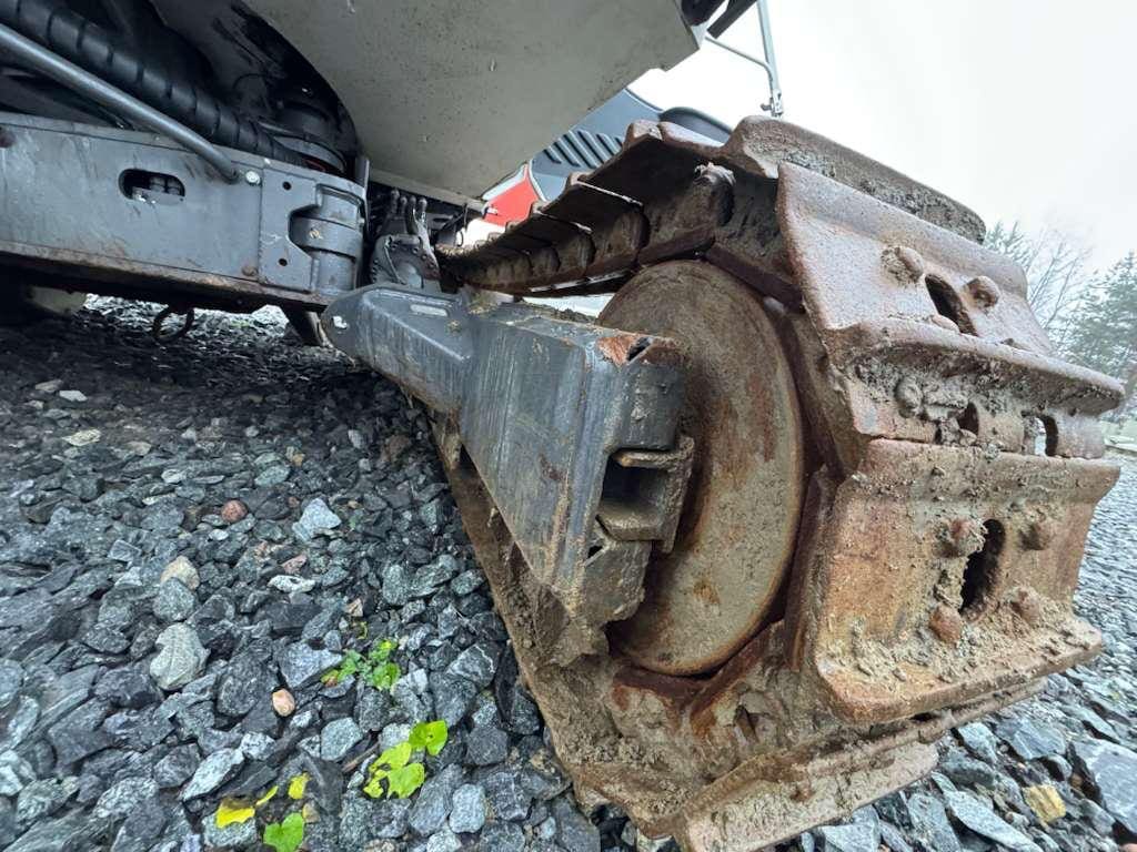Close-up of rusty excavator track