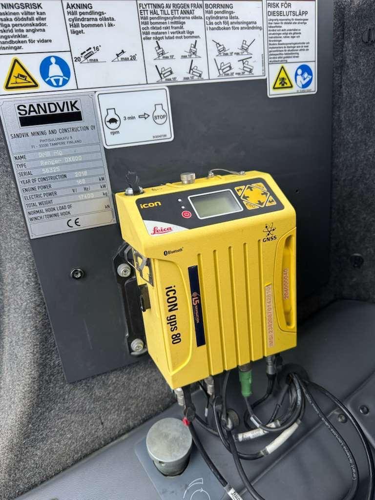 Yellow Leica iCON GPS receiver mounted on panel